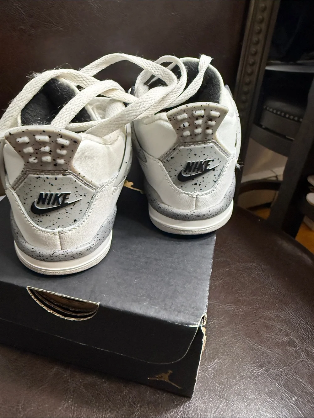Nike Kids White Sneakers with Black Soles and Red Jumpman